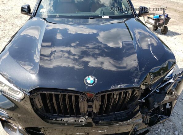 5UXJU4C02M9E97812 2021 BMW X5 Черный Вид подкапотного пространства