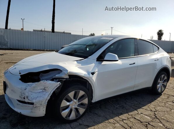7SAYGDEE7RF079016 2024 TESLA MODEL White Առջևի ձախ երեք քառորդ տեսարան