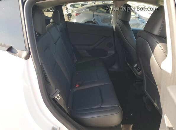 7SAYGDEE7RF079016 2024 TESLA MODEL White Հետևի նստատեղերի տեսք