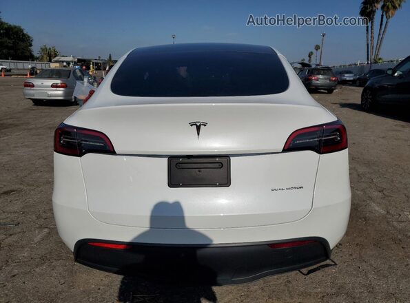 7SAYGDEE7RF079016 2024 TESLA MODEL White Հետևի տեսք