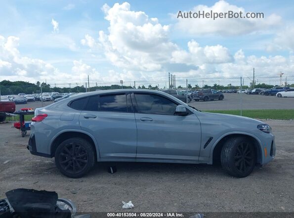 5UX33DT07R9V14782 2024 BMW X4 Серый Вид задней части салона