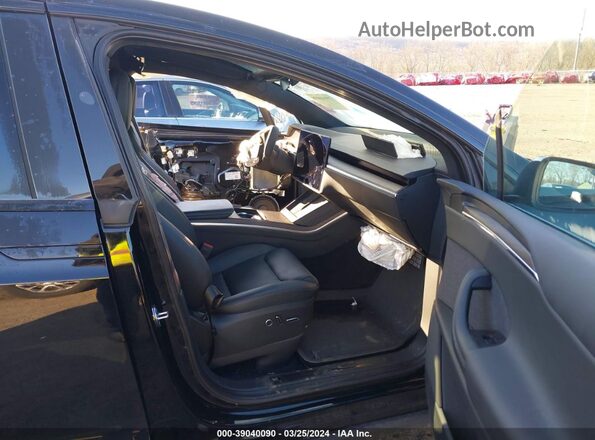 7SAXCDE57PF408446 2023 TESLA MODEL X Черный Вид салона спереди