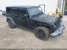 2016 Jeep Wrangler Unlimited Willys Wheeler Black vin: 1C4BJWDG9GL233884