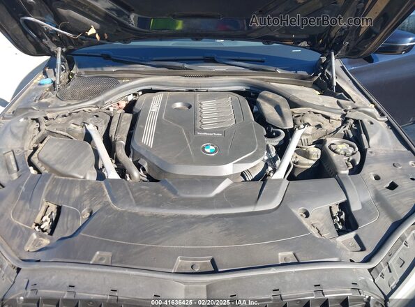 WBA7T2C06NCJ31319 2022 BMW OTHER Dark Blue Widok z tyłu
