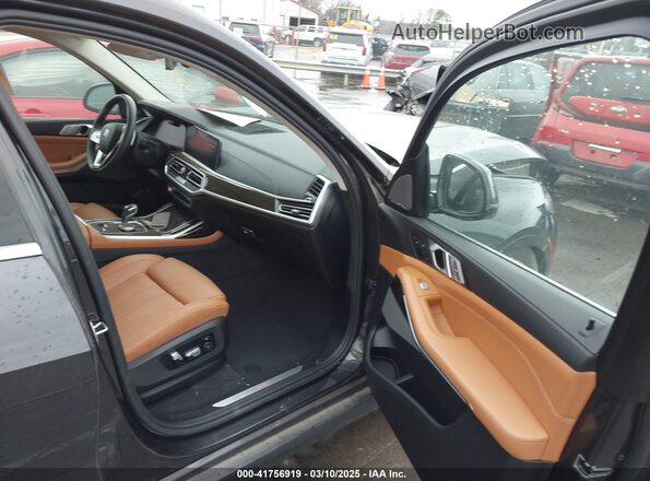 5UXCW2C04M9D99050 2021 BMW X7 Black წინა სალონის ხედი
