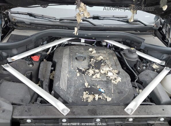 5UXCW2C04M9D99050 2021 BMW X7 Black უკანა ხედი