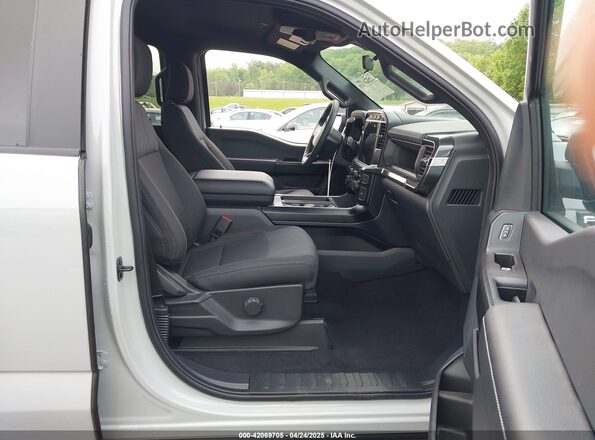 1FTFW2L55RKD98710 2024 FORD F150 Серый Вид салона спереди