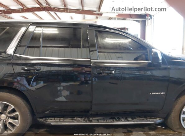 1GNSCMKD8RR184286 2024 CHEVROLET TAHOE Black Widok wnętrza z tyłu
