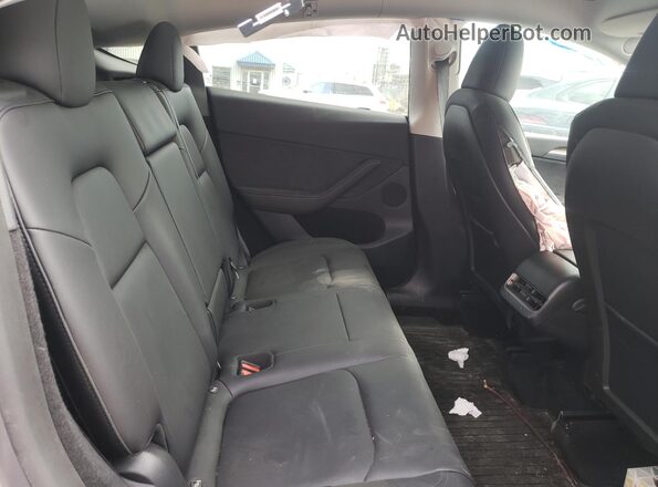 7SAYGDEEXRF181989 2024 TESLA MODEL Gray Vista de los asientos traseros