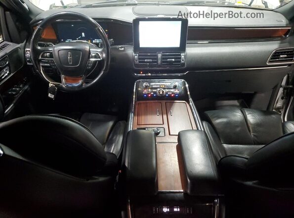 5LMJJ2LT1JEL04387 2018 LINCOLN NAVIGATOR Серебряный Вид панели приборов