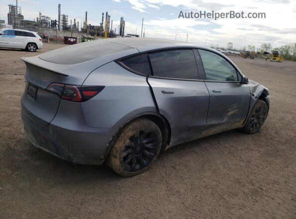 7SAYGDEEXRF181989 2024 TESLA MODEL Gray Trasero derecho