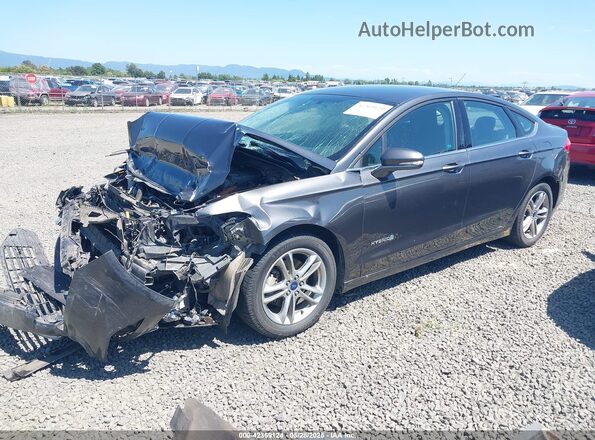 3FA6P0LU3GR386983 2016 FORD FUSION HYBRID Black Front left