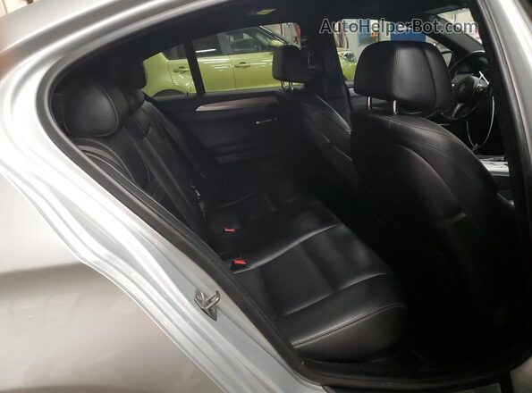 WBA5B3C53GG254566 2016 BMW 5 SERIES Silver Vista de los asientos traseros