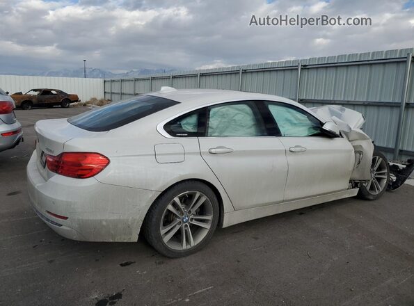 WBA4C9C54GG136537 2016 BMW OTHER Белый Задняя правая четверть