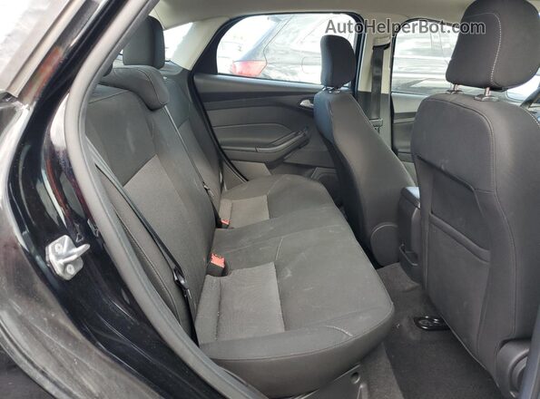 1FADP3FE0JL229964 2018 FORD FOCUS Black Vista de los asientos traseros