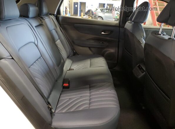 JN1DF0CD9PM701477 2023 NISSAN ARIYA White Vista interior trasera