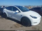 2023 Tesla Model Y Awd/long Range Dual Motor All-wheel Drive White vin: 7SAYGDEE8PF705377