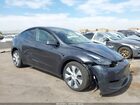 2024 Tesla Model Y Long Range Dual Motor All-wheel Drive Серый vin: 7SAYGDEEXRF080483
