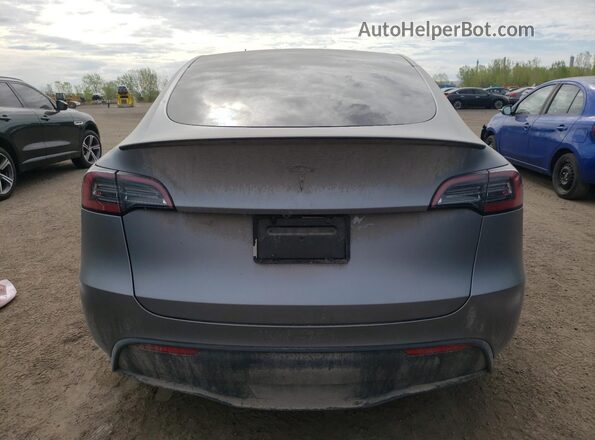 7SAYGDEEXRF181989 2024 TESLA MODEL Gray Vista trasera