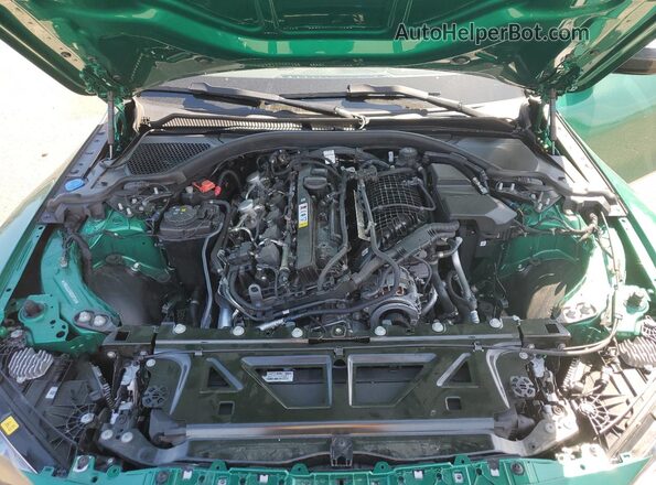WBS43AZ05RCR91749 2024 BMW M4 Зеленый Вид задней части салона