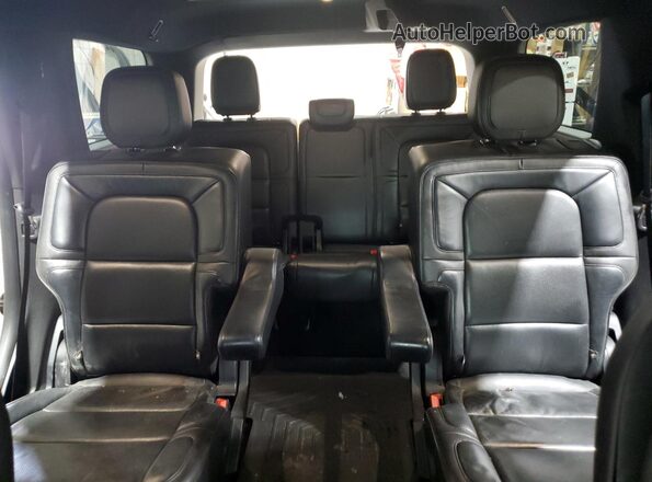 5LMJJ2LT1JEL04387 2018 LINCOLN NAVIGATOR Серебряный Вид задних сидений
