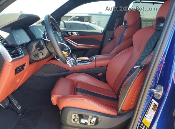 5YMJU0C05N9M64142 2022 BMW X5 Blue Front interior view