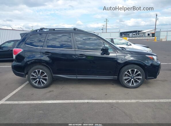 JF2SJGECXJH524164 2018 SUBARU FORESTER2. Black Rear interior view