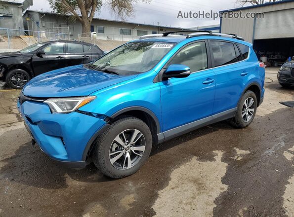 JTMRFREV8JD233911 2018 TOYOTA RAV4 Blue Առջևի ձախ երեք քառորդ տեսարան
