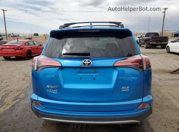 JTMRFREV8JD233911 2018 TOYOTA RAV4 Blue Հետևի տեսք