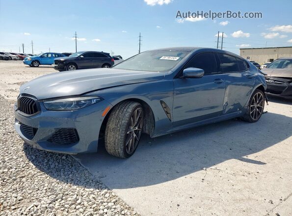 WBAGV8C06NCH98097 2022 BMW M8 Blue Vista tres cuartos delantera izquierda