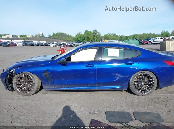 WBSGV0C0XRCN44778 2024 BMW M8 Blue Widok wnętrza z tyłu