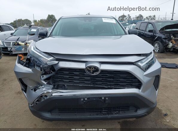 2T3F1RFV0RC460994 2024 TOYOTA LE Silver Սարքավորումների վահանակի տեսք