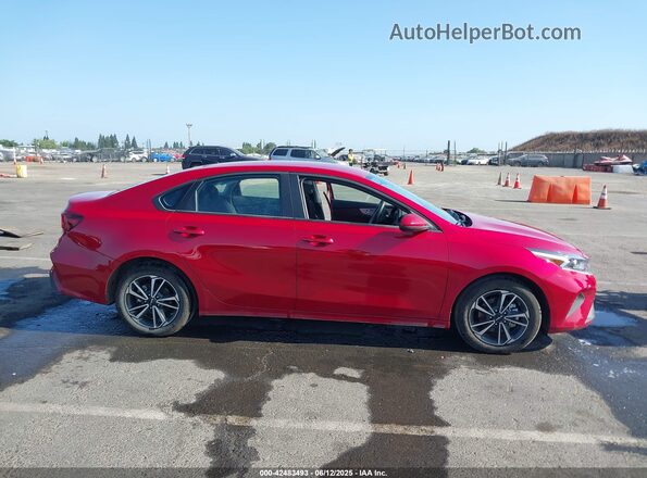 3KPF24AD6RE835781 2024 KIA FORTE Красный Вид задней части салона