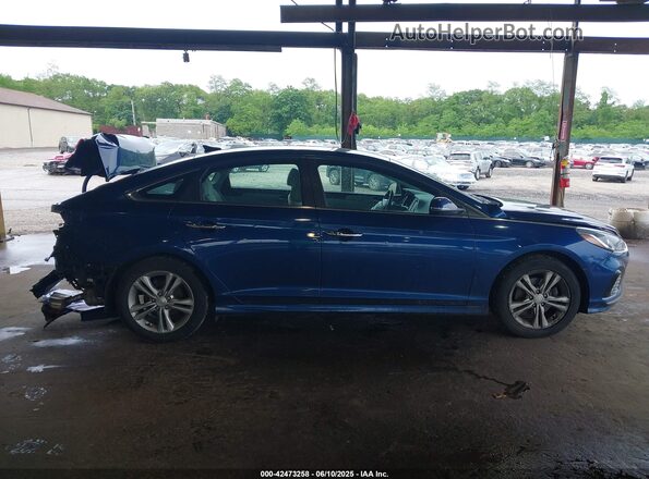 5NPE34AF5KH785404 2019 HYUNDAI SONATA Blue Սալոնի հետևի տեսք