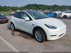 2023 Tesla Model Y   White vin: 7SAYGAEE2PF648446