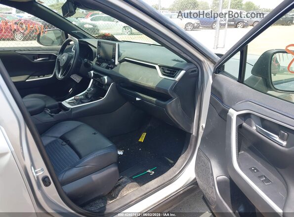 JTMEWRFV8KJ016570 2019 TOYOTA RAV4 HYBRID Silver Widok wnętrza z przodu