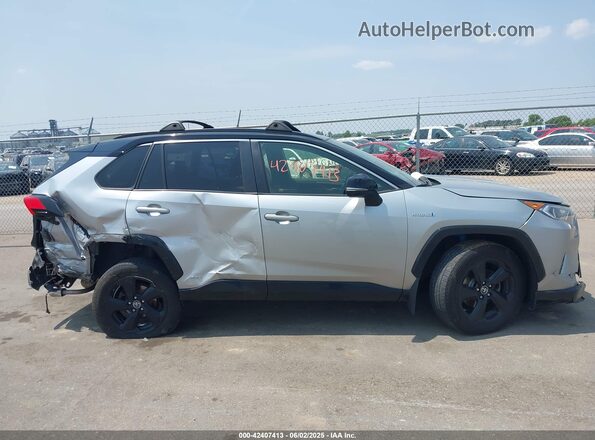 JTMEWRFV8KJ016570 2019 TOYOTA RAV4 HYBRID Silver Widok wnętrza z tyłu