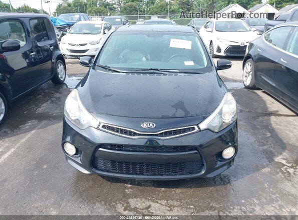 KNAFX6A81G5604437 2016 KIA FORTE KOUP Black Vista del cuadro de instrumentos