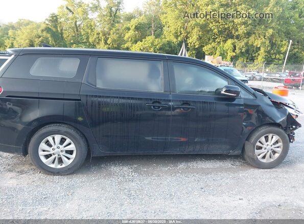 KNDMA5C10G6180653 2016 KIA SEDONA Black Widok wnętrza z tyłu