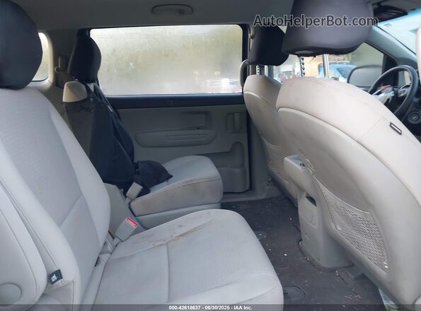 KNDMA5C10G6180653 2016 KIA SEDONA Black Widok naklejki z numerem VIN