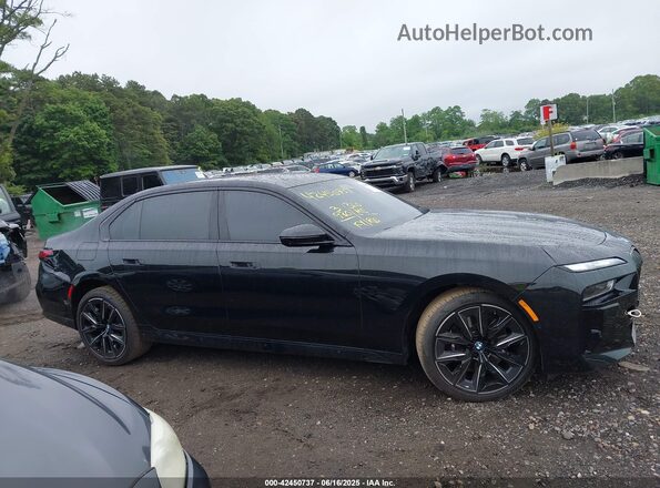 WBA33EJ02RCT04455 2024 BMW OTHER Black Սալոնի հետևի տեսք