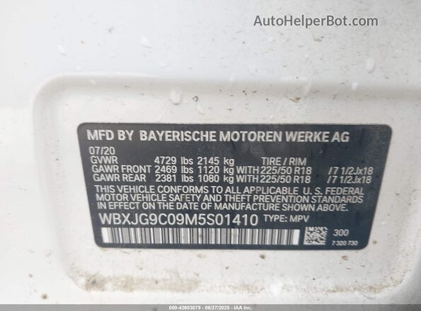 WBXJG9C09M5S01410 2021 BMW X1 White Engine compartment view