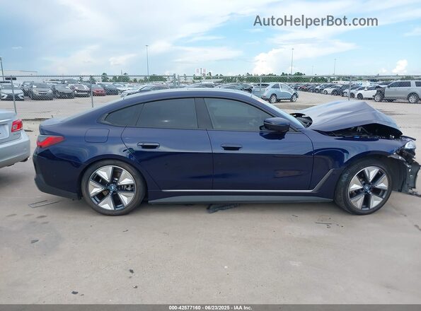WBY73AW02PFP85131 2023 BMW I4 Dark Blue Սալոնի 360 աստիճան տեսք
