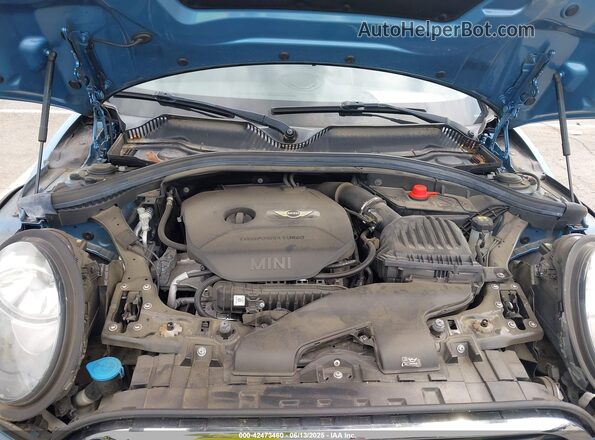 WMWLU1C54H2F27554 2017 MINI CLUBMAN Light Blue Вид сзади