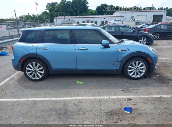 WMWLU1C54H2F27554 2017 MINI CLUBMAN Light Blue Вид задней части салона