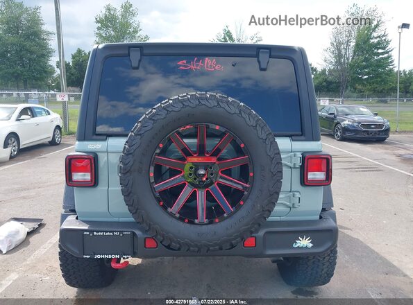 1C4HJXFN4PW603083 2023 JEEP WRANGLER Зеленый 
