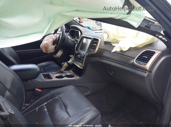 1C4RJEBGXGC335304 2016 JEEP GRAND CHEROKEE Gray Widok wnętrza z przodu