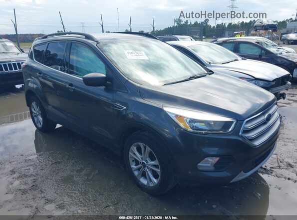 1FMCU0GD7JUD33912 2018 FORD ESCAPE Gray Rear interior view