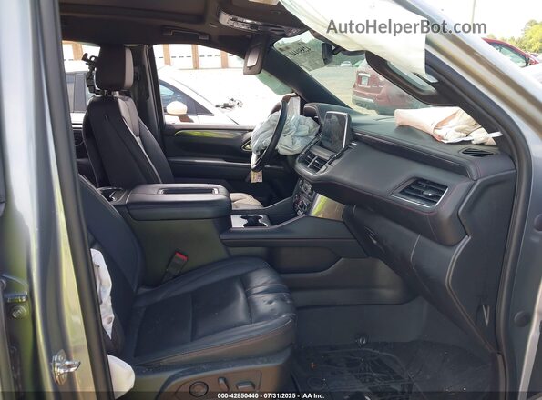 1GNSKRKD2PR335202 2023 CHEVROLET TAHOE Silver წინა სალონის ხედი