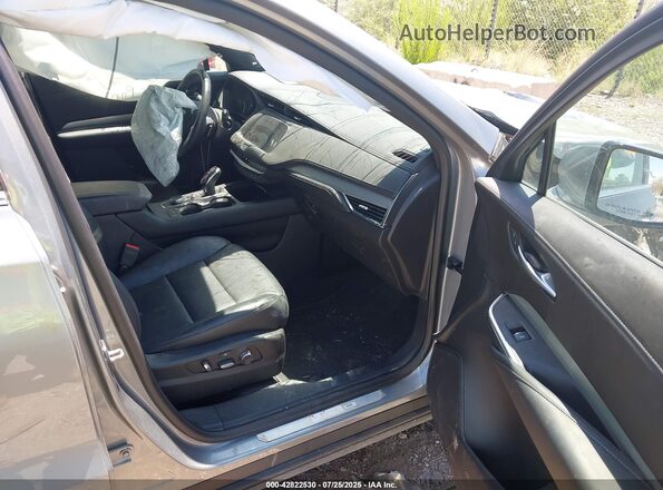 1GYFZDR42PF217886 2023 CADILLAC XT4 Gray წინა სალონის ხედი